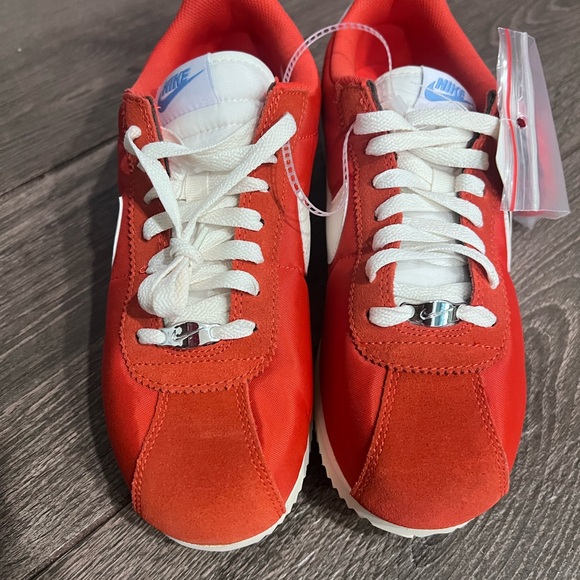 Nike Shoes - Nike Red and White Low-Top Running Sneakers